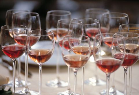 Group of Glasses Filled with Red wine and placed on the table